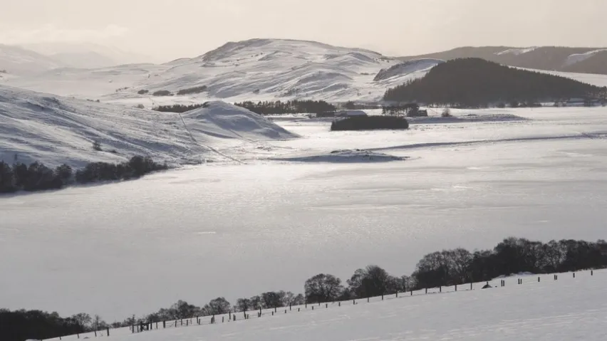 A snow covered view of Loch Ruthven. 