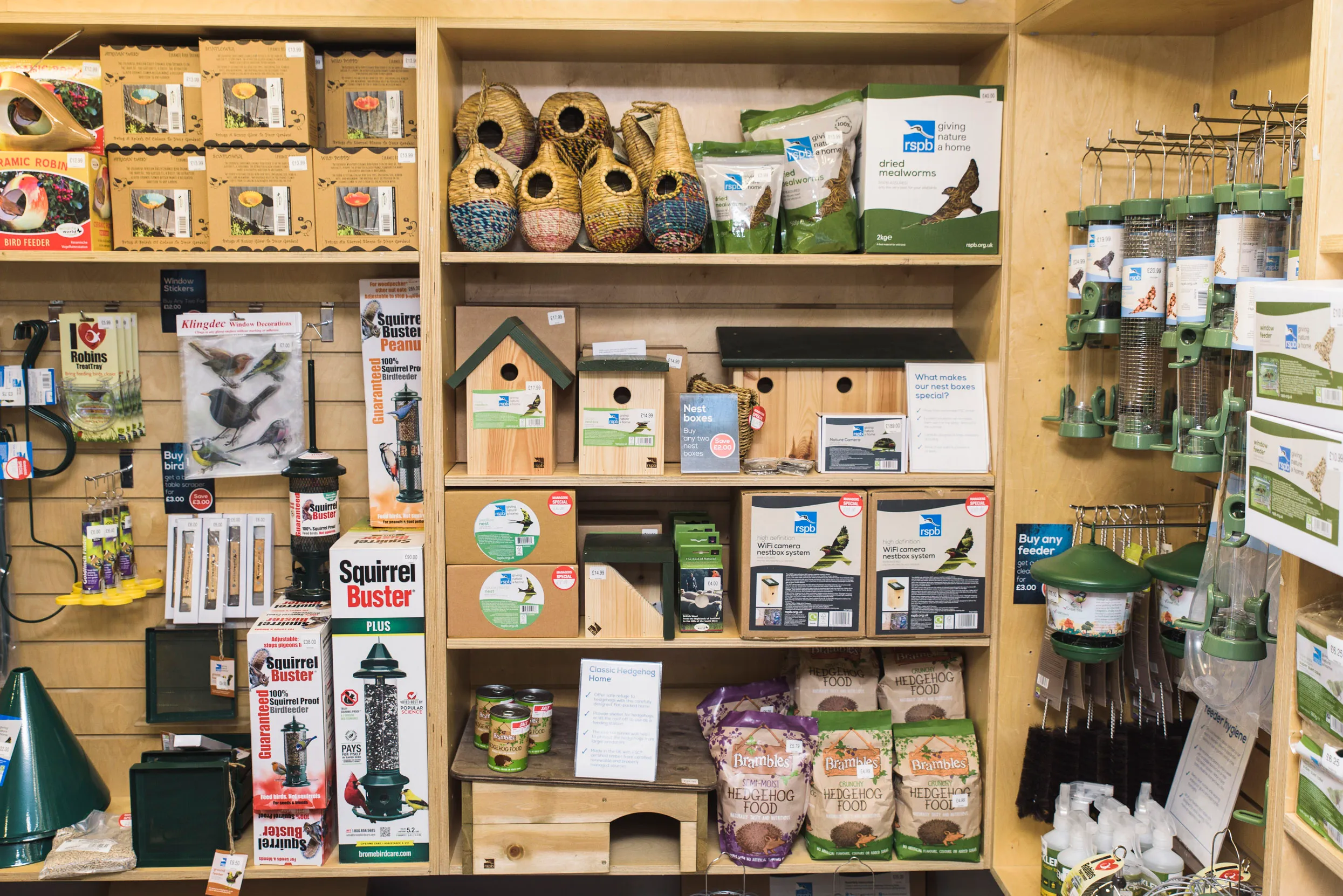 Store shelves consisting of RSPB bird and nest boxes.